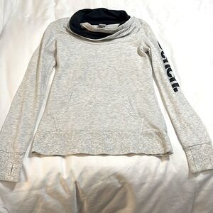 Buckle long sleeve cowneck. Small.